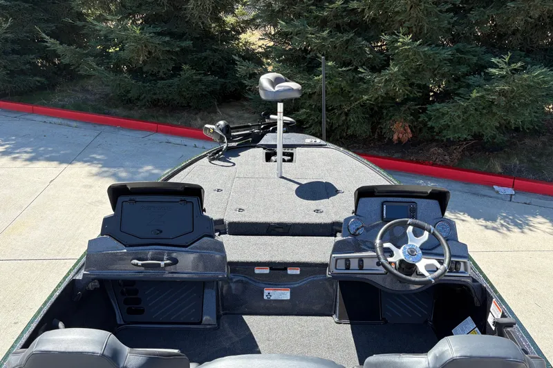 Slide: The Image of 2027 Nitro Z18 XL boat interior with steering wheel and control panel. - 20