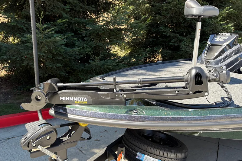 Slide: The Image of Minn Kota Maxxum trolling motor on 2027 Nitro Z18 XL boat deck. - 13
