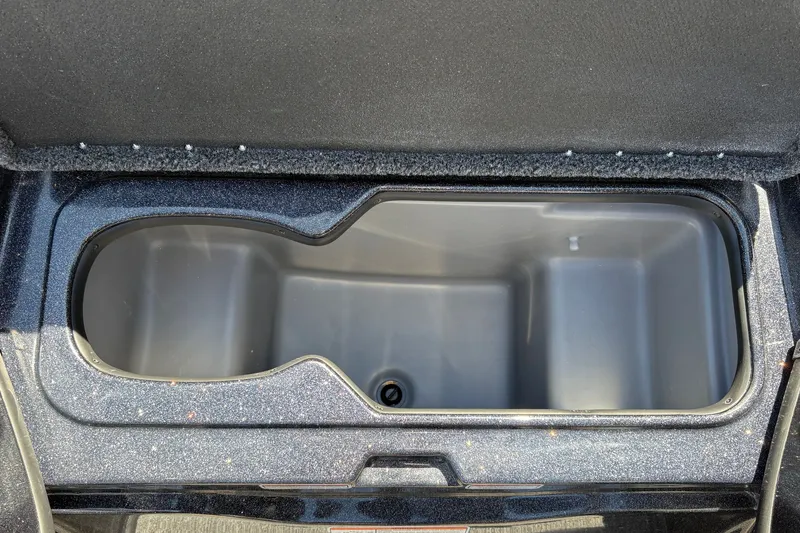 Slide: The Image of Open storage compartment in 2027 Nitro Z18 XL boat. - 33