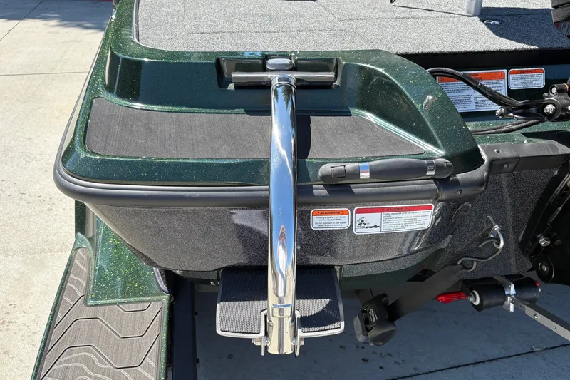 Slide: The Image of Rear view of a 2027 Nitro Z18 XL boat with metallic finish and safety labels. - 27