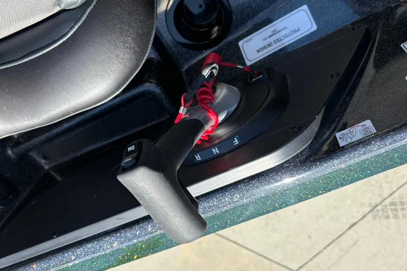 Slide: The Image of Boat throttle control of a 2027 Nitro Z18 XL, featuring forward, neutral, and reverse settings. - 23