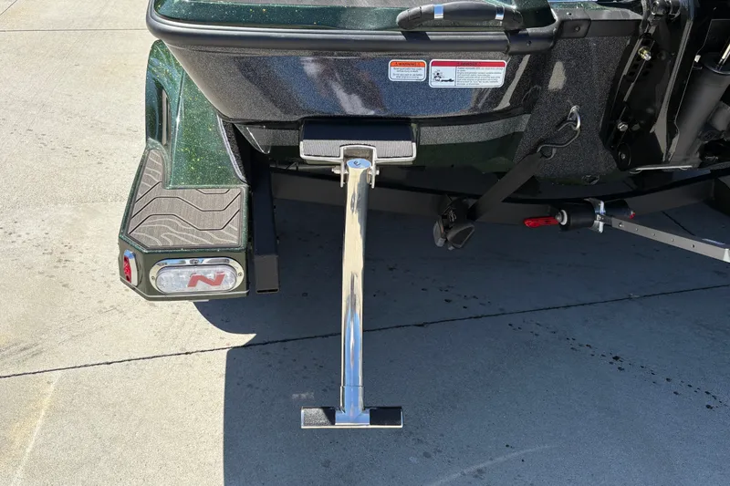 Slide: The Image of Rear view of 2027 Nitro Z18 XL boat trailer with support stand on concrete. - 28