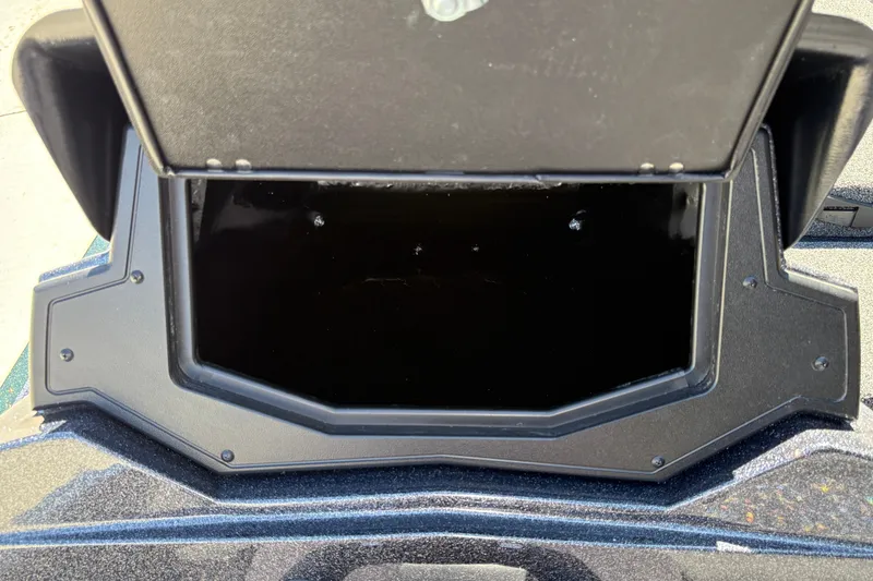 Slide: The Image of Open storage compartment of 2027 Nitro Z18 XL boat. - 25