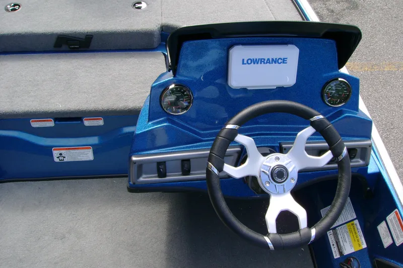 Slide: The Image of Steering console of a 2027 Nitro Z18 XL boat with Lowrance display. - 13