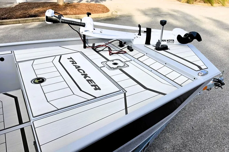 Slide: The Image of 2027 Tracker Bass Tracker Classic CC boat deck with Minn Kota trolling motor. - 14