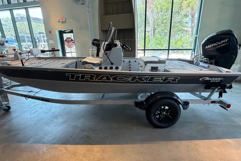 The Image of 2027 Tracker Bass Tracker Classic CC boat on trailer in showroom. - 0