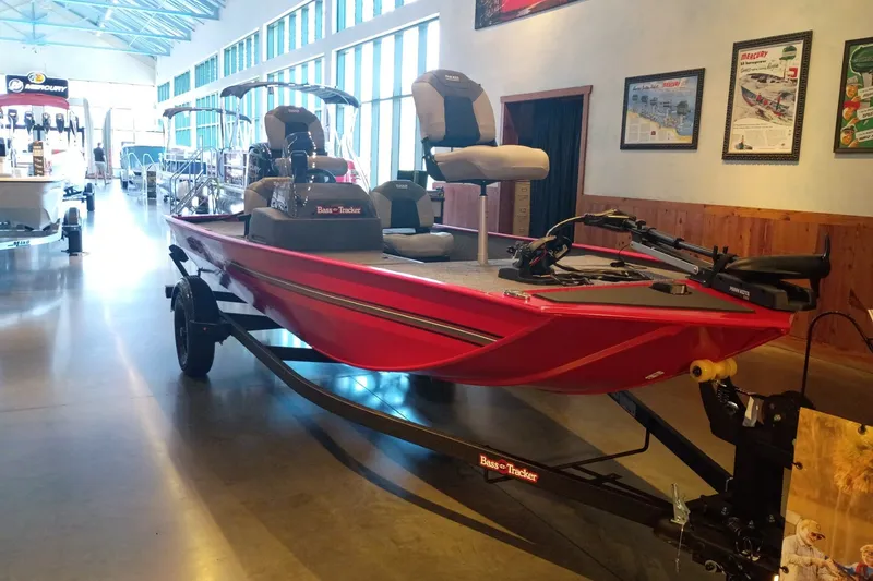 The Image of 2027 Tracker Bass Tracker Classic XL boat displayed in a showroom. - 0