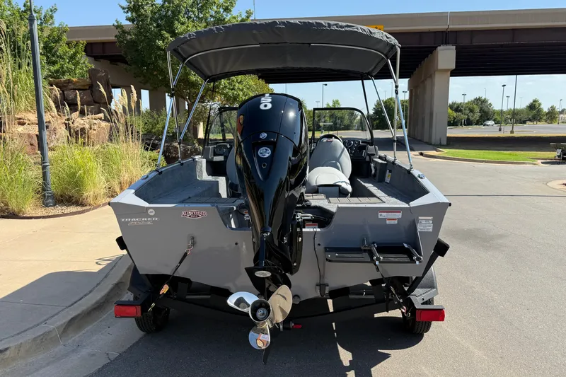 Slide: The Image of 2027 Tracker Pro Guide V-175 Combo boat with outboard motor on trailer. - 16