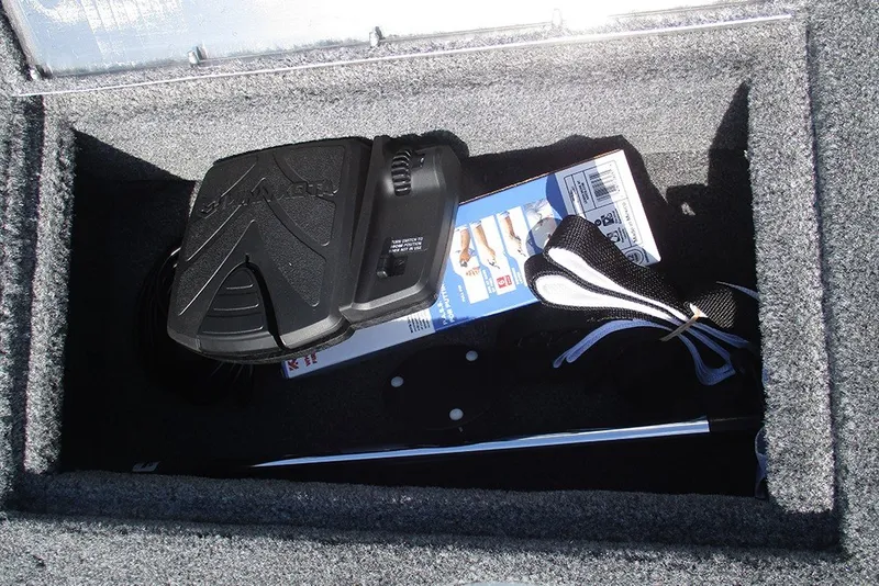 Slide: The Image of Storage compartment in 2027 Tracker Super Guide V-16 SC boat with accessories. - 14