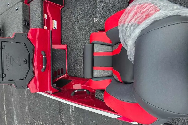 Slide: The Image of Red and gray interior of 2027 Nitro Z18 XL boat with seating and storage. - 11