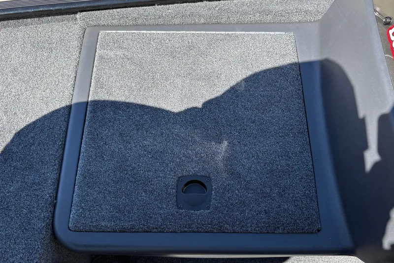 Slide: The Image of Carpeted storage compartment on 2027 Tracker Bass Tracker Classic XL boat. - 27