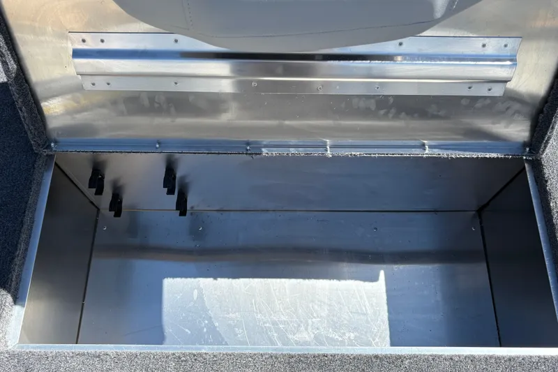 Slide: The Image of Open storage compartment in 2027 Tracker Bass Tracker Classic XL boat. - 19