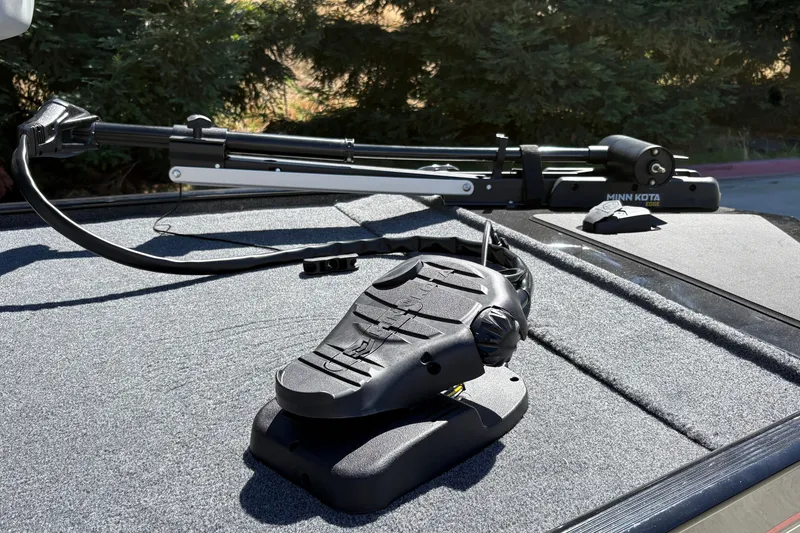Slide: The Image of 2027 Tracker Bass Tracker Classic XL with Minn Kota trolling motor on deck. - 25