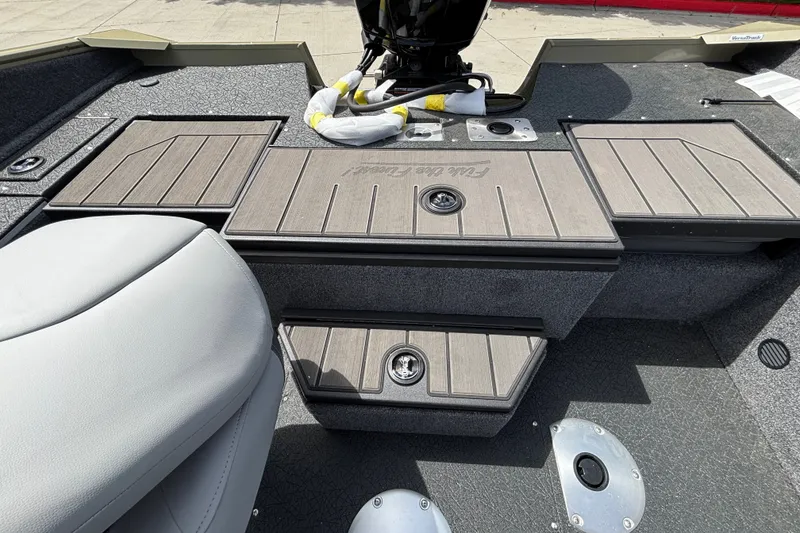 Slide: The Image of 2027 Tracker Pro Guide V-175 Combo boat interior with seating and storage compartments. - 22