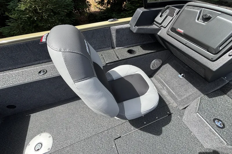 Slide: The Image of 2027 Tracker Pro Guide V-175 Combo boat interior with gray seating and console. - 42
