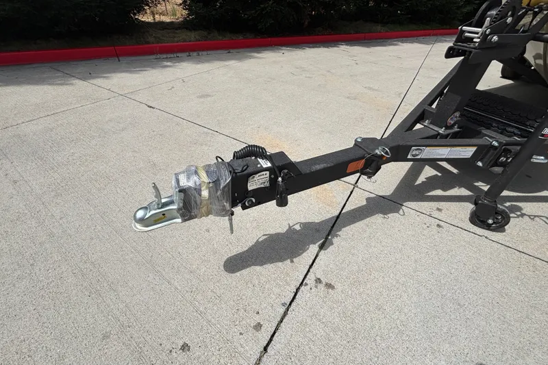 Slide: The Image of Trailer hitch of 2027 Tracker Pro Guide V-175 Combo on concrete surface. - 19