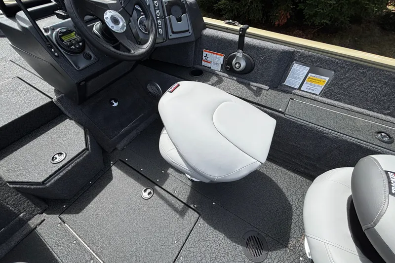 Slide: The Image of Interior of 2027 Tracker Pro Guide V-175 Combo boat with steering console and seating. - 31