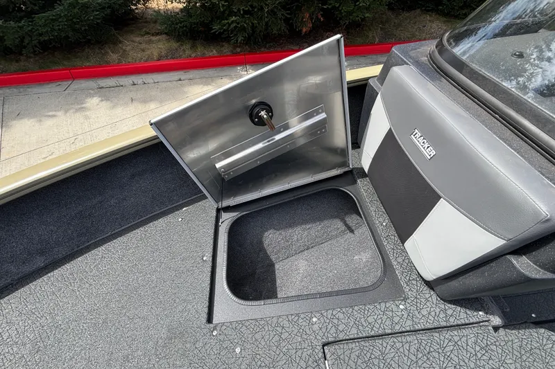 Slide: The Image of Open storage compartment on 2027 Tracker Pro Guide V-175 Combo boat deck. - 39