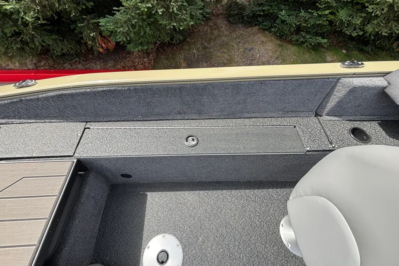 Slide: The Image of Interior view of 2027 Tracker Pro Guide V-175 Combo boat with seating and storage. - 45