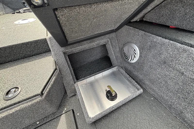 Slide: The Image of Interior of 2027 Tracker Pro Guide V-175 Combo boat with storage compartment. - 55