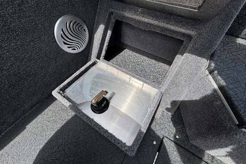 Slide: The Image of Interior of 2027 Tracker Pro Guide V-175 Combo boat with storage compartment. - 56