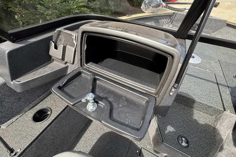 Slide: The Image of Open storage compartment on 2027 Tracker Pro Guide V-175 Combo boat deck. - 36
