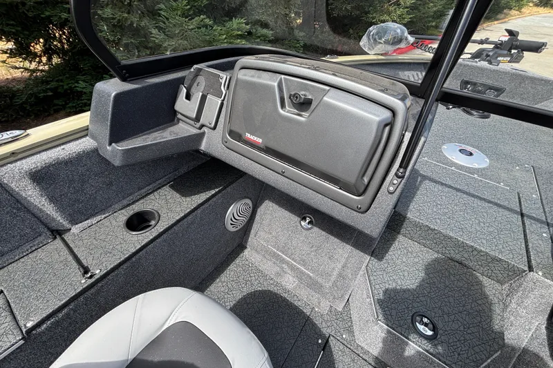 Slide: The Image of Interior view of 2027 Tracker Pro Guide V-175 Combo boat, featuring seating and storage compartments. - 46