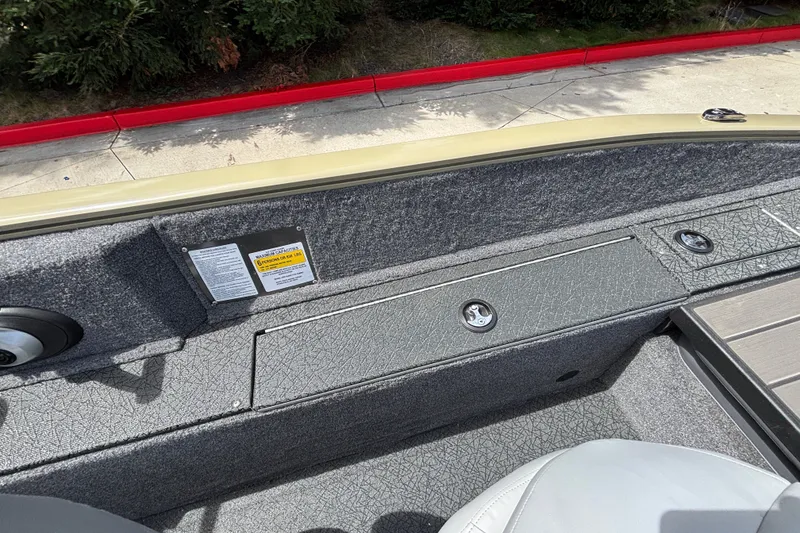 Slide: The Image of Interior view of 2027 Tracker Pro Guide V-175 Combo boat, featuring storage compartments and seating. - 38