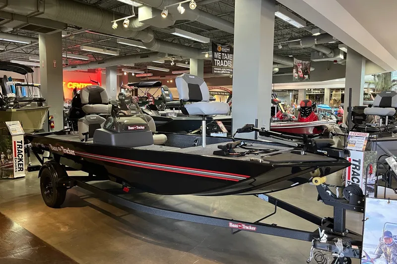 The Image of 2027 Tracker Bass Tracker Classic XL boat displayed in a showroom. - 0
