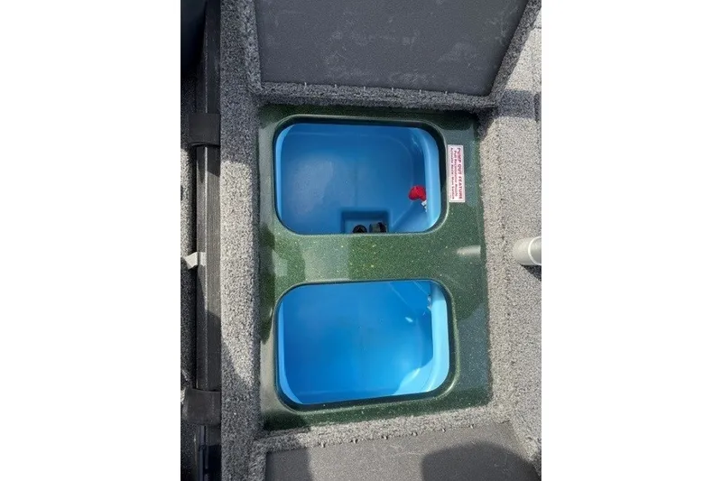 Slide: The Image of Livewell compartments in a 2027 Nitro Z18 XL boat, featuring dual blue tanks. - 15