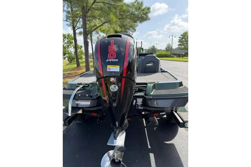 Slide: The Image of 2027 Nitro Z18 XL boat with 150 Pro motor, parked on a sunny day. - 5