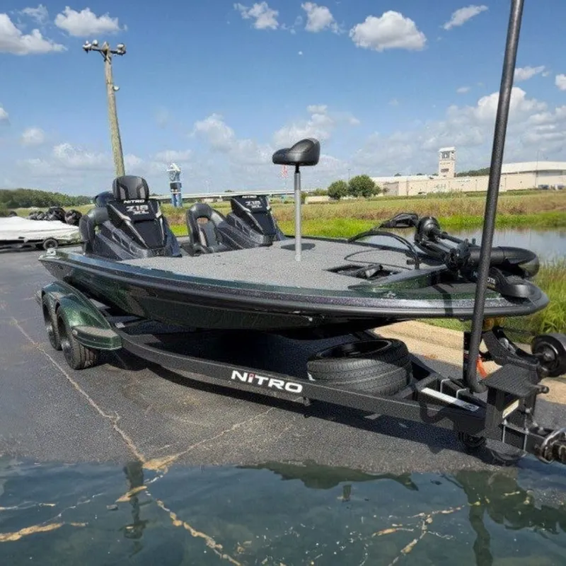 Slide: The Image of 2027 Nitro Z18 XL fishing boat on trailer, parked outdoors. - 1