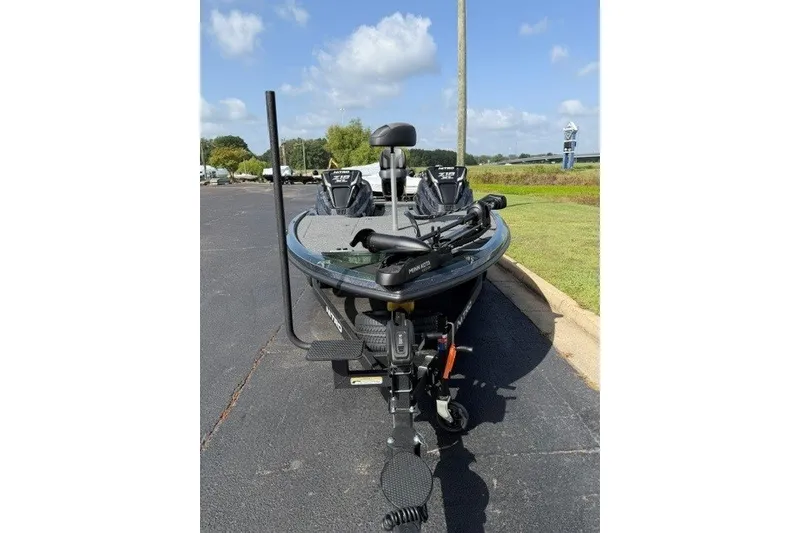 Slide: The Image of 2027 Nitro Z18 XL fishing boat parked on asphalt, featuring advanced equipment. - 4