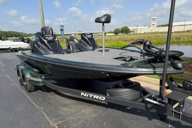 The Image of 2027 Nitro Z18 XL fishing boat on trailer, parked outdoors. - 0