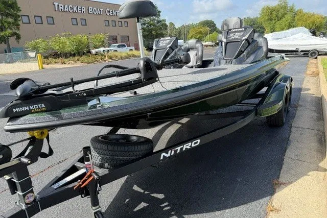 Slide: The Image of 2027 Nitro Z18 XL boat on trailer, parked outside Tracker Boat Center. - 1