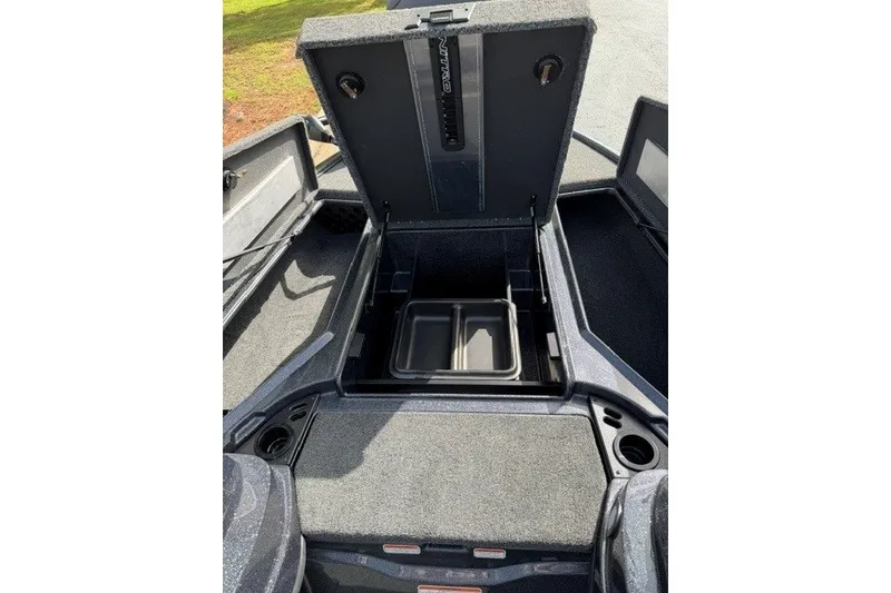 Slide: The Image of Open storage compartment of a 2027 Nitro Z18 XL boat, showcasing interior space. - 8