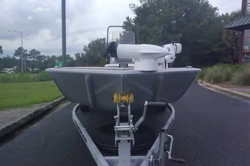 Slide: The Image of 2027 Tracker Bass Tracker Classic CC boat on trailer, parked on roadside. - 19