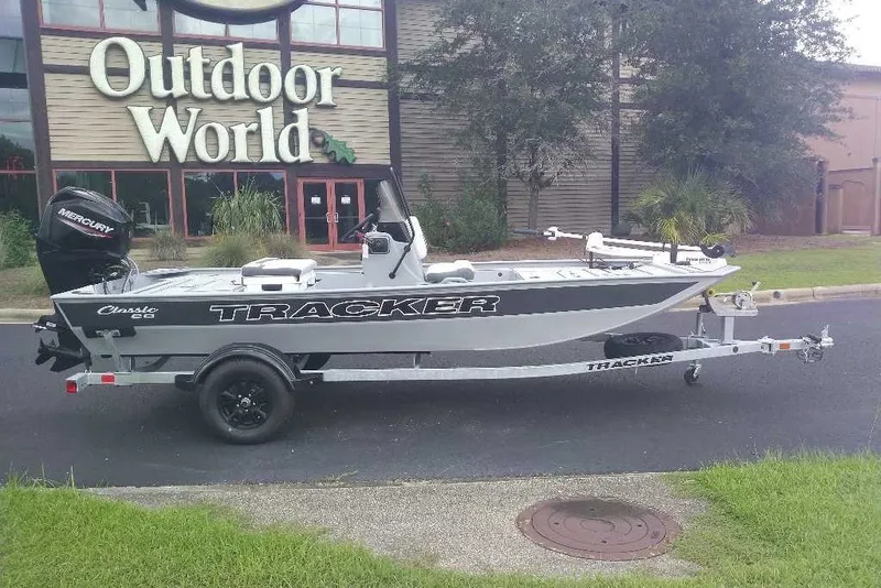 Slide: The Image of 2027 Tracker Bass Tracker Classic CC boat on trailer outside Outdoor World. - 20