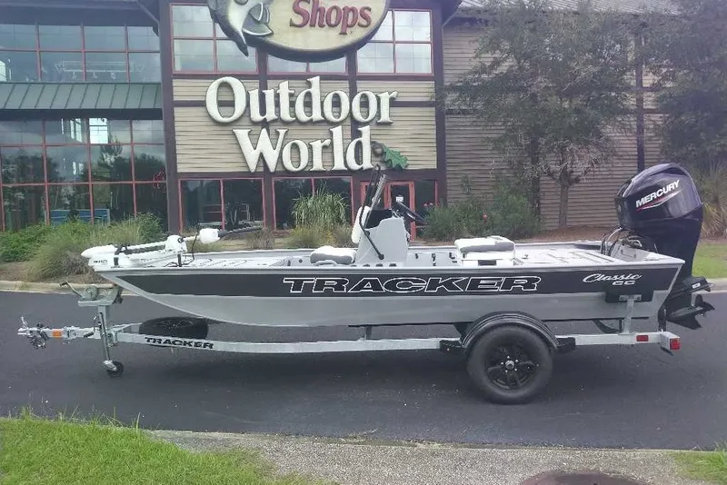 The Image of 2027 Tracker Bass Tracker Classic CC boat displayed outside Outdoor World store. - 0