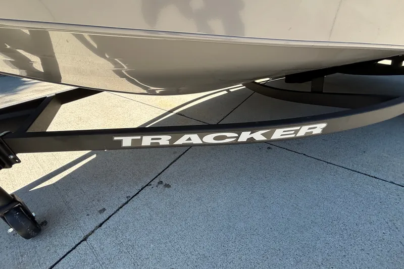 Slide: The Image of 2027 Tracker Super Guide V-16 SC boat trailer on concrete surface. - 39