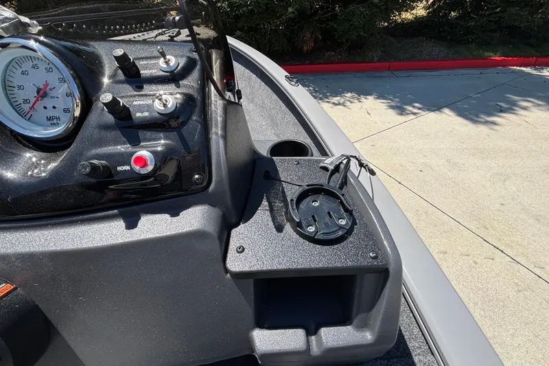 Slide: The Image of Dashboard of 2027 Tracker Super Guide V-16 SC boat with gauges and controls. - 15