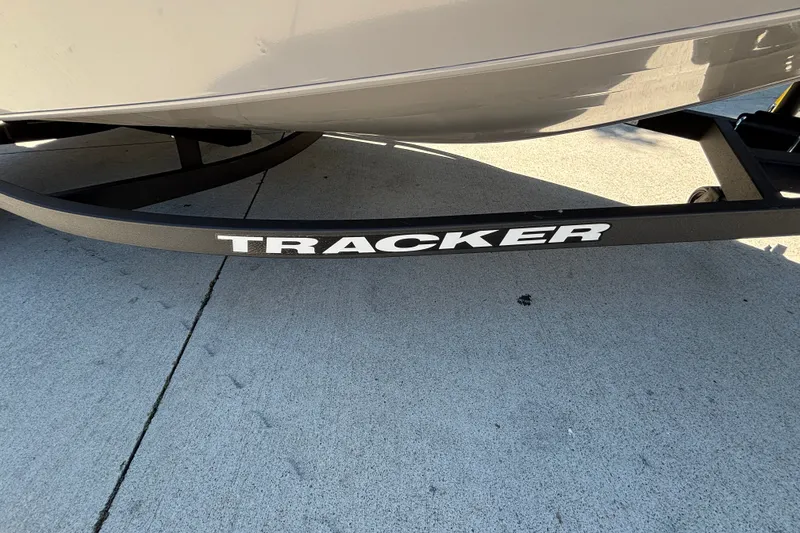 Slide: The Image of 2027 Tracker Super Guide V-16 SC boat trailer on concrete surface. - 38