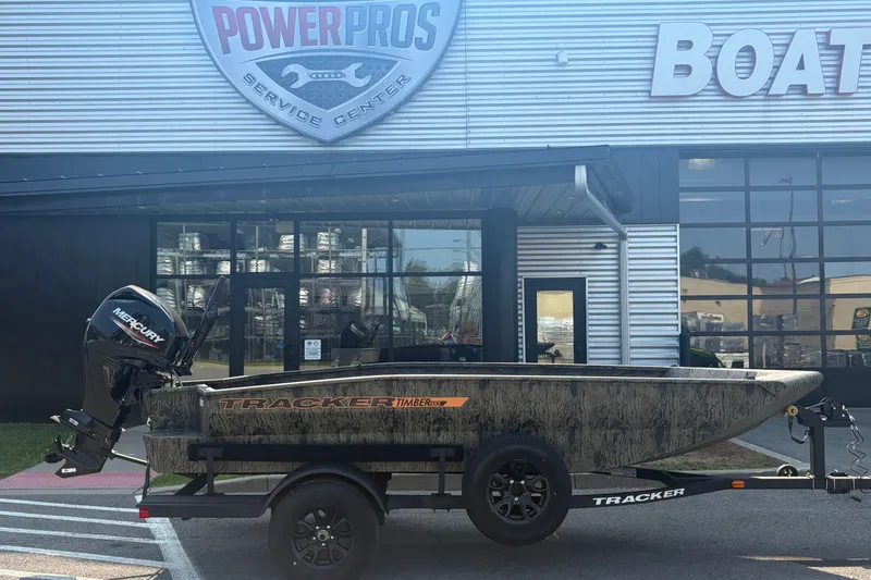 The Image of 2027 Tracker Grizzly 1553 Timber boat parked outside Power Pros service center. - 0