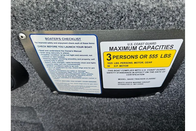 Slide: The Image of Boater's checklist and capacity label on 2027 Tracker Bass Tracker Classic XL boat. - 16