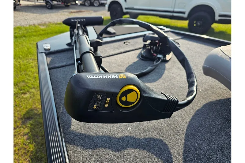 Slide: The Image of 2027 Tracker Bass Tracker Classic XL with Minn Kota trolling motor on deck. - 20