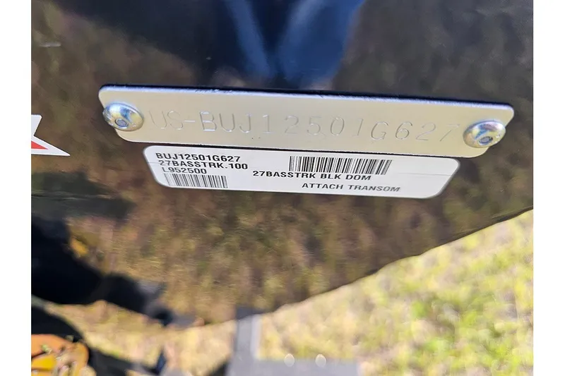 Slide: The Image of 2027 Tracker Bass Tracker Classic XL transom with identification plate and barcode. - 23