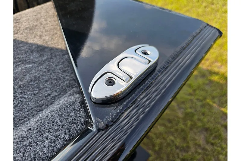 Slide: The Image of Close-up of 2027 Tracker Bass Tracker Classic XL boat cleat on deck. - 21