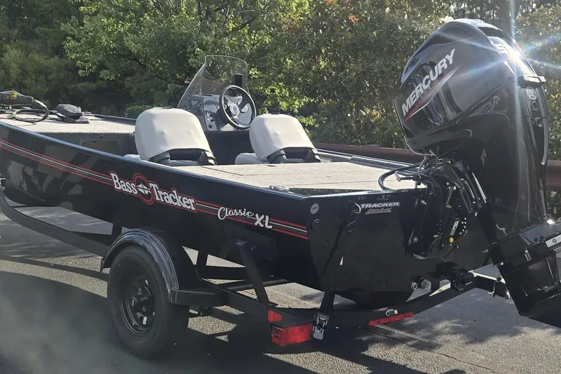 The Image of 2027 Tracker Bass Tracker Classic XL boat with Mercury engine on trailer. - 0
