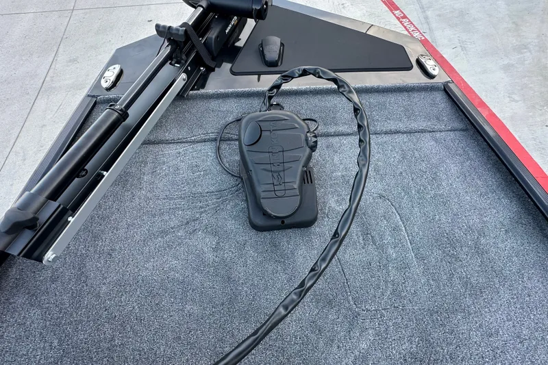 Slide: The Image of 2027 Tracker Bass Tracker Classic XL boat deck with trolling motor pedal. - 63