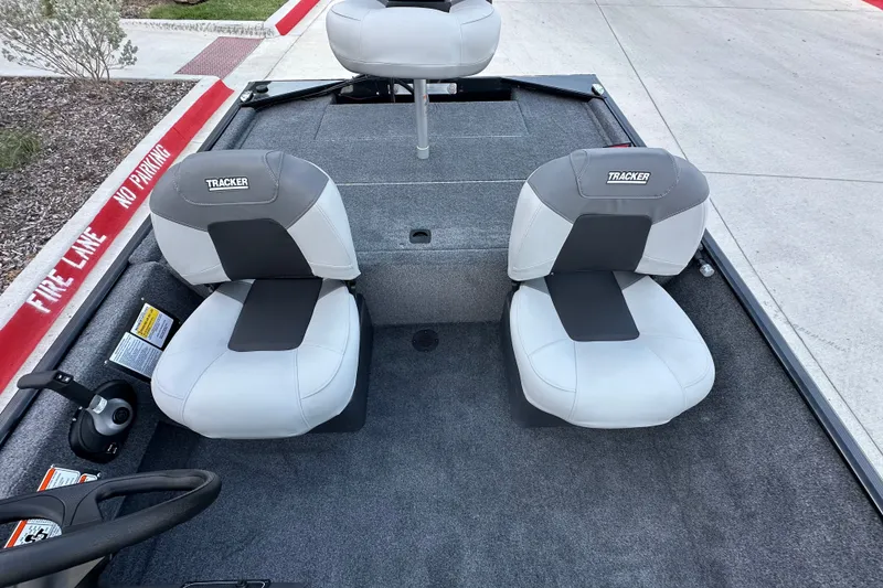 Slide: The Image of 2027 Tracker Bass Tracker Classic XL boat interior with two gray seats. - 67